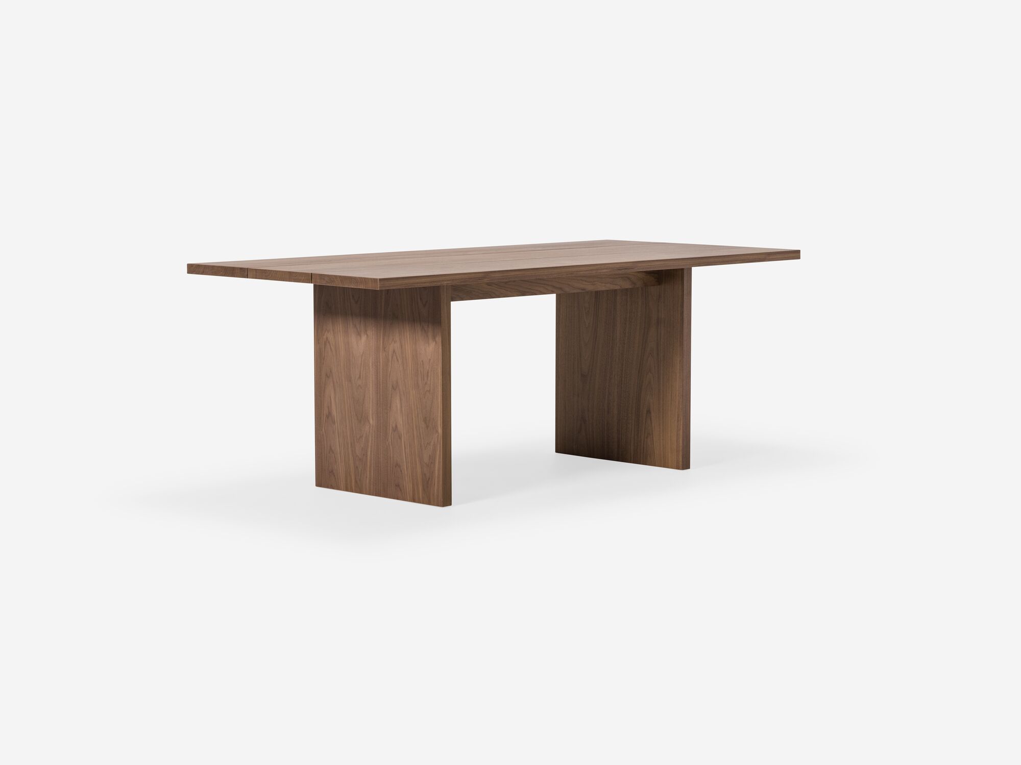 Walnut dining table with two legs front angle view